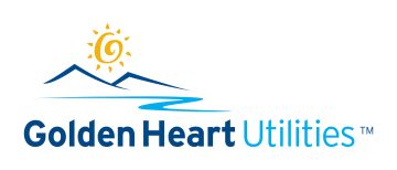 Golden Heart Utilities logo featuring a sun, mountains, and water symbolizing energy and reliability.